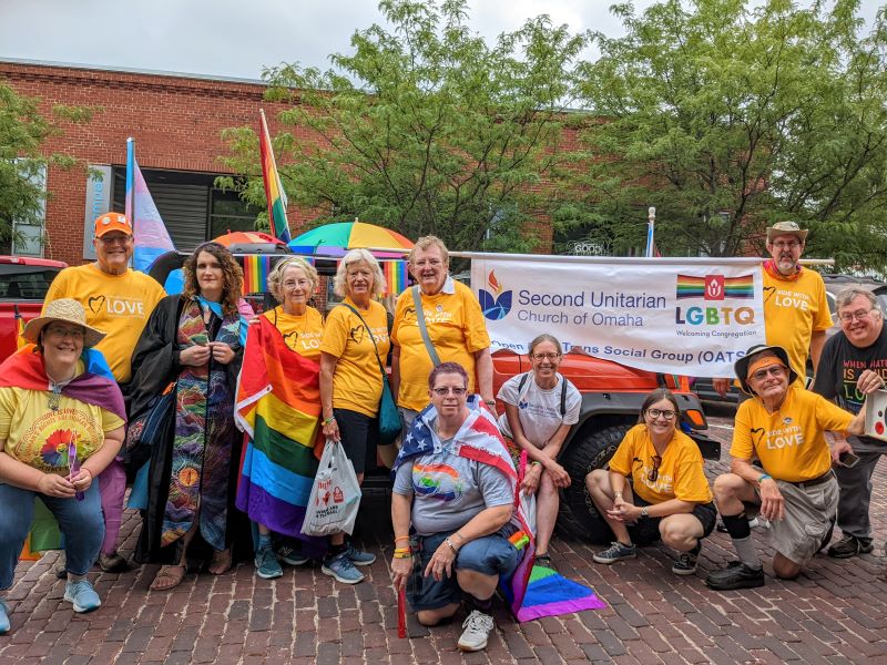 A dozen Second Unitarian Church members gathered to march in 2022 Heartland Pride Parade