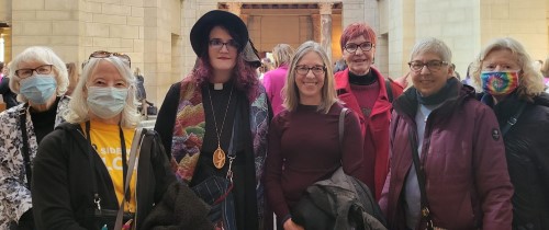 Seven Second Unitarian Church women standing in the rotunda of the Nebraska State Capitol